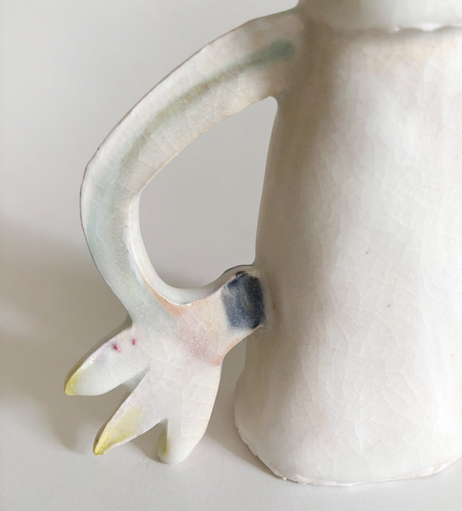 One Cyclamen holding a candle