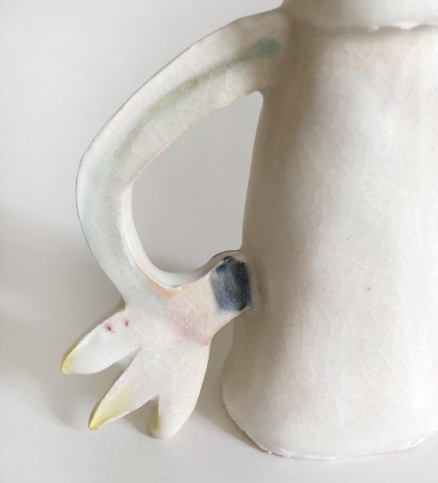 One Cyclamen holding a candle