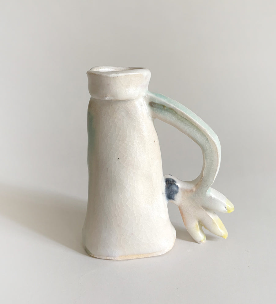 One Cyclamen holding a candle