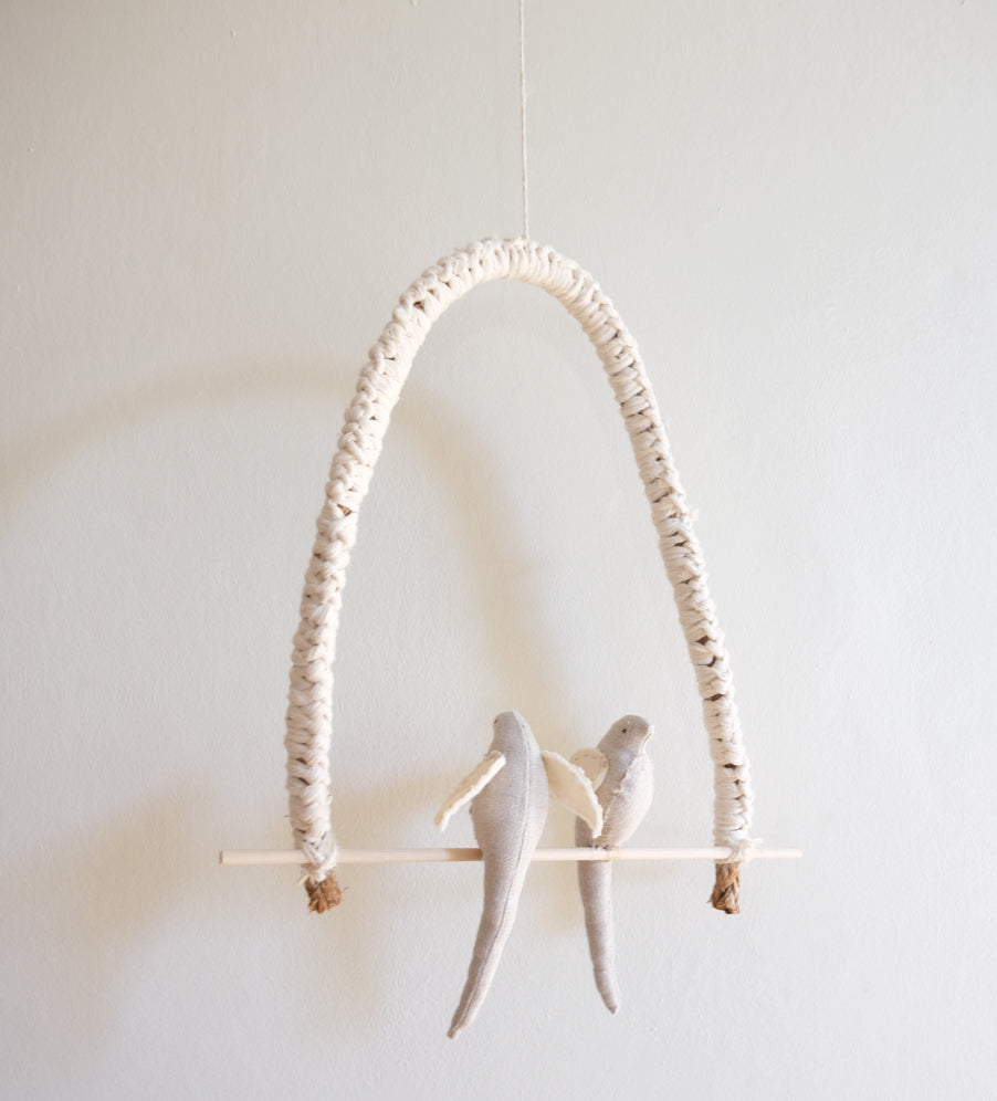 Love birds on a perch