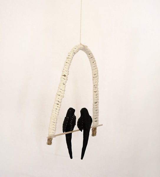 Love birds on a perch - Black Birds