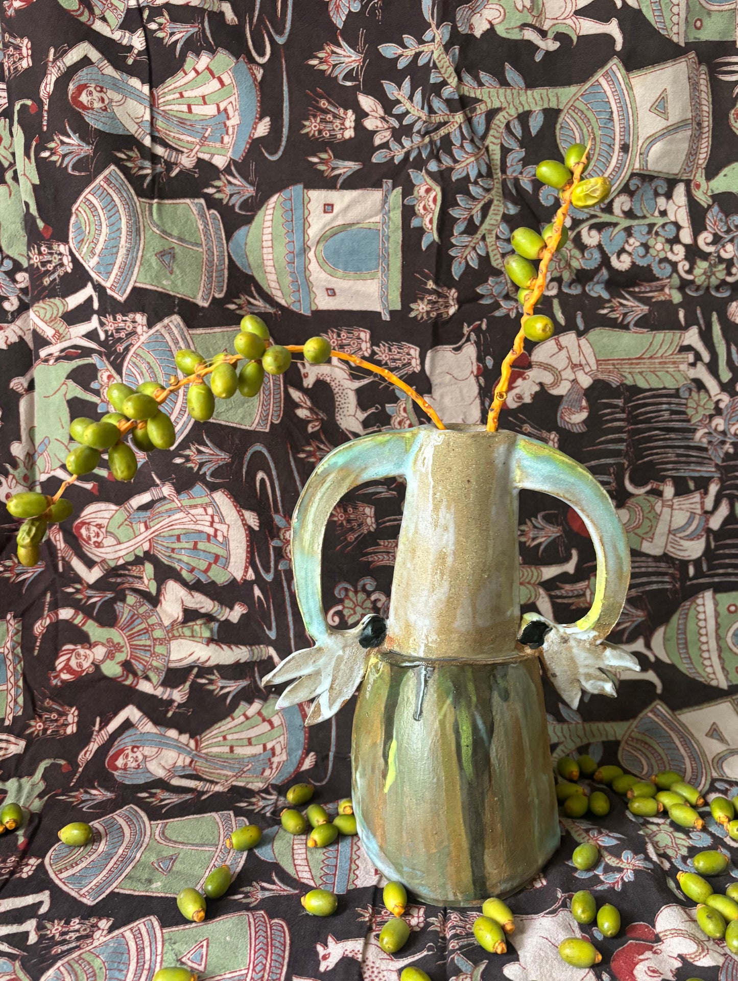Two cyclamens on top of a mountain - vase