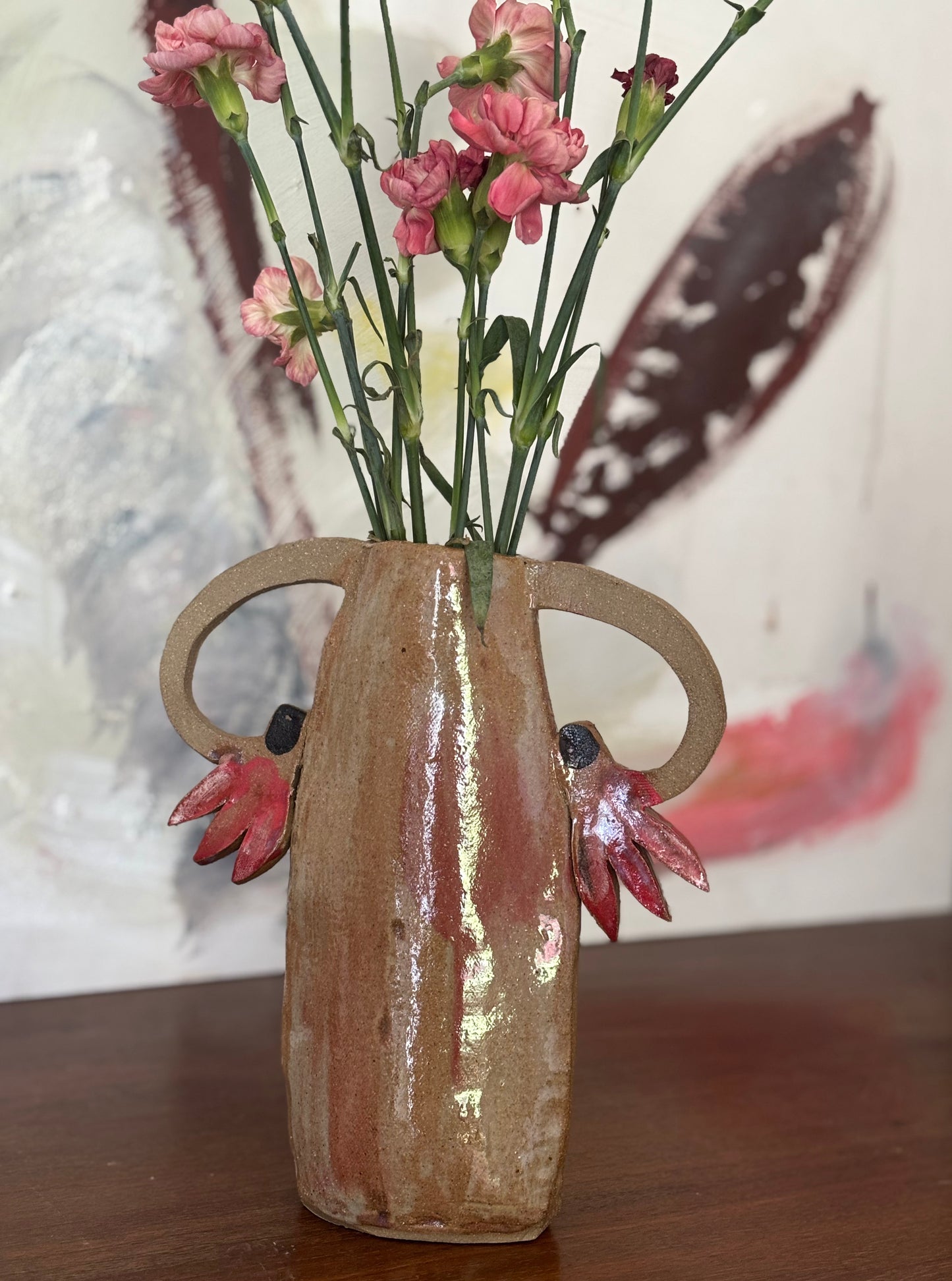 Two red cyclamens - vase