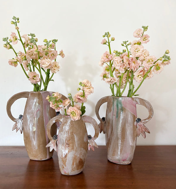 Pink cyclamens - vases
