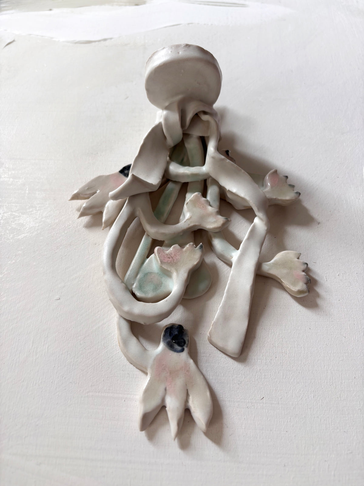 Hanging Cyclmens & snowbells bouquet wall candle holder