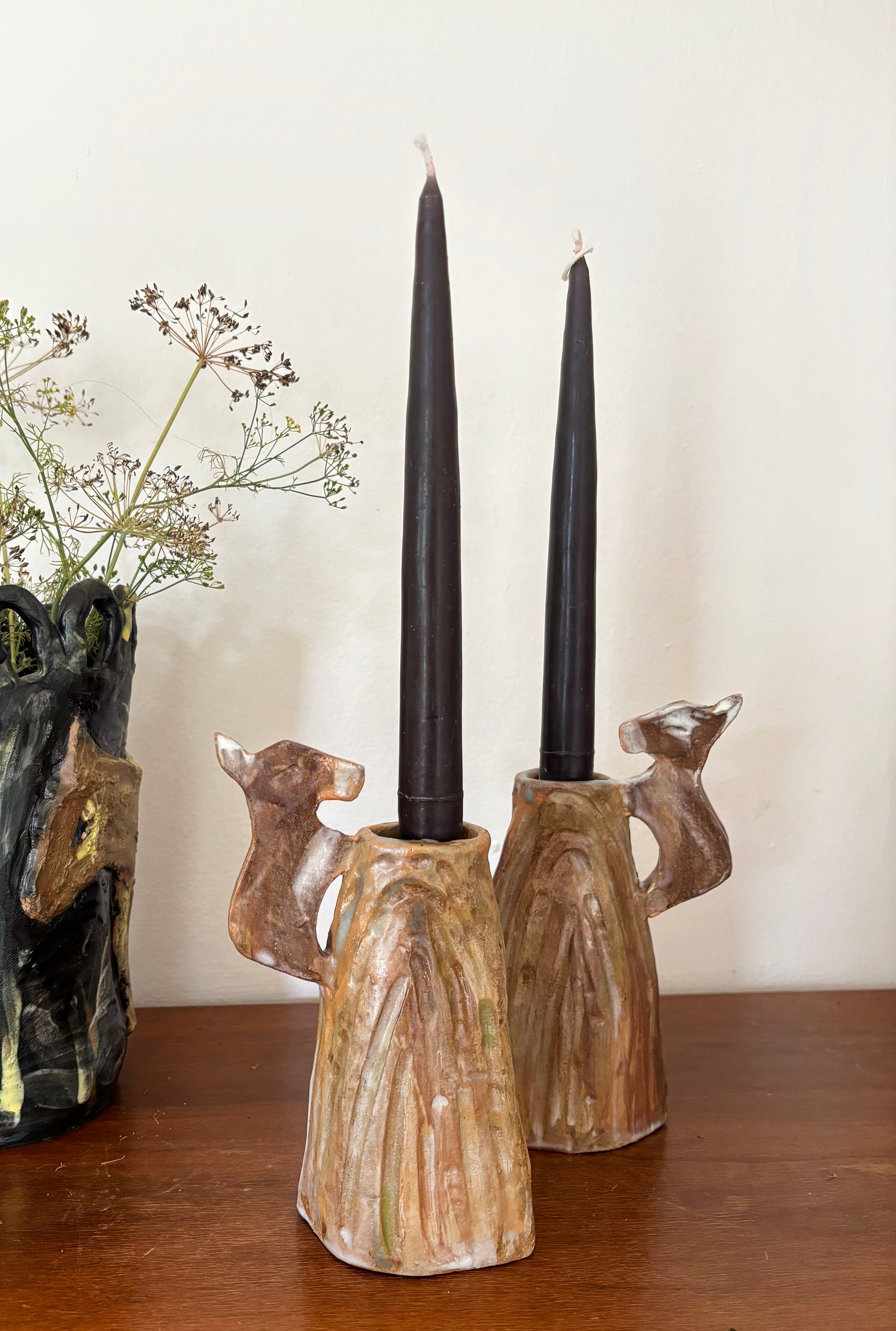Donkeys climbing to the top of the mountain - Candle holders