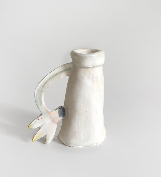 One Cyclamen holding a candle