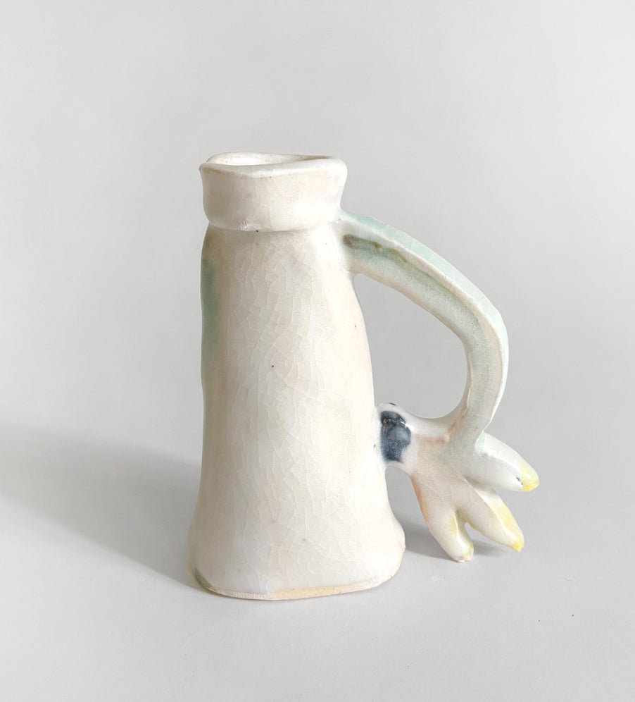 One Cyclamen holding a candle