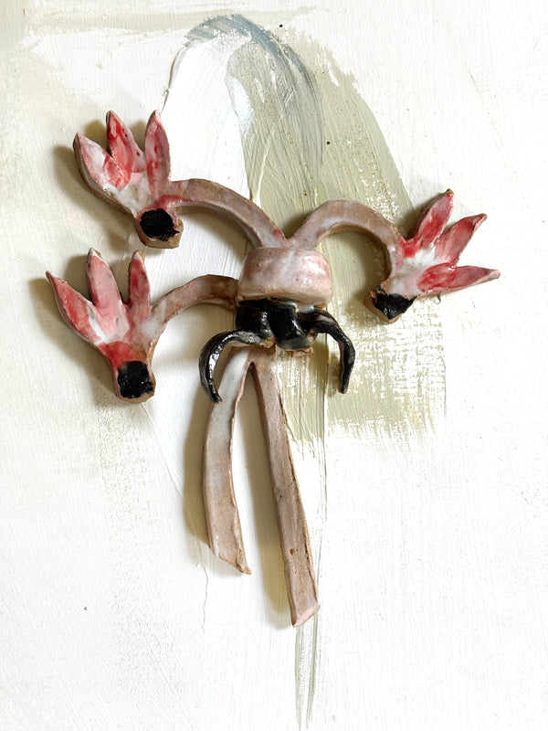 Cyclamens boutonniere wall candle holder