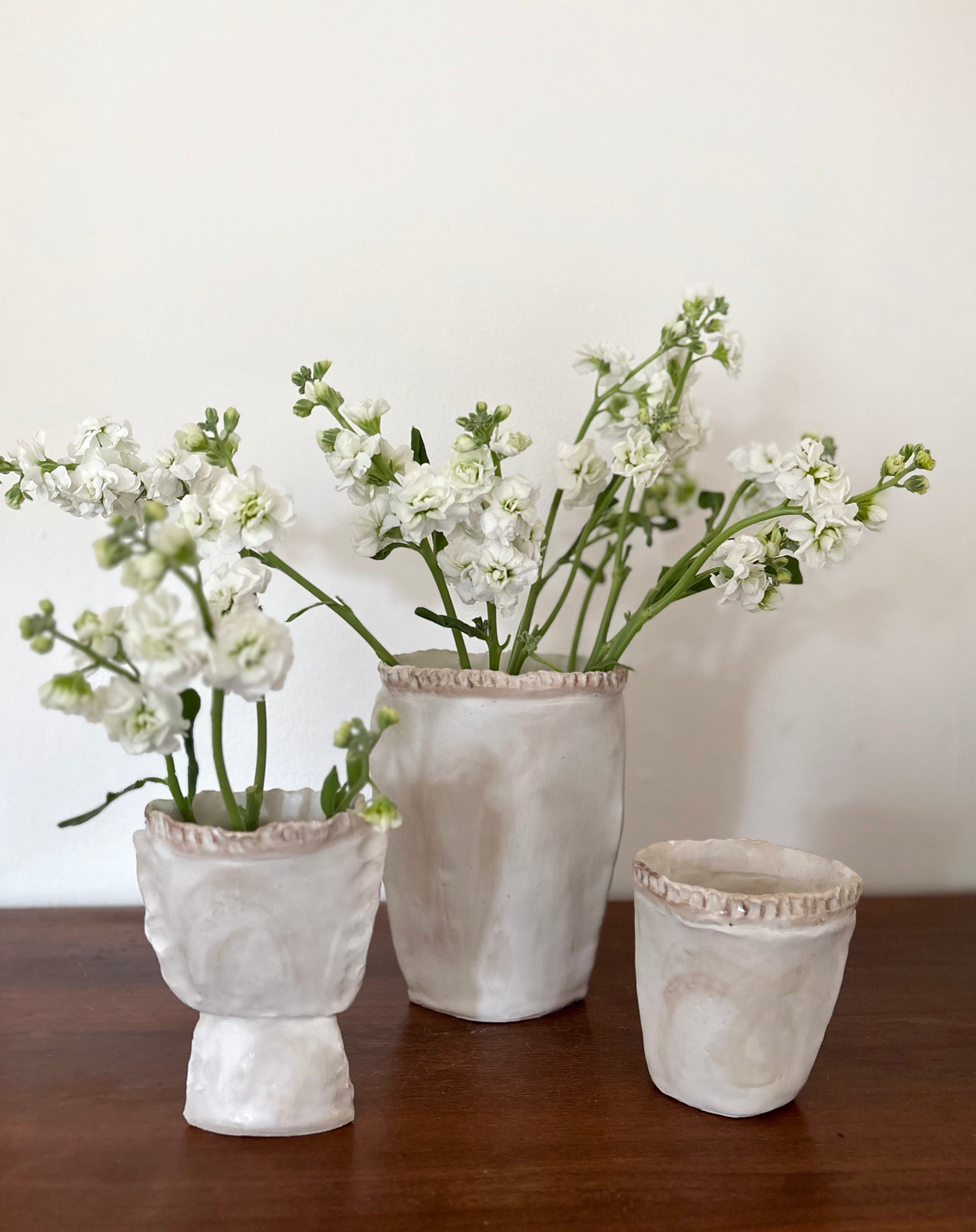White flower pods vases