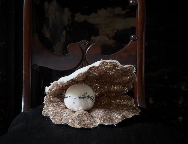 Pearl in a shell
